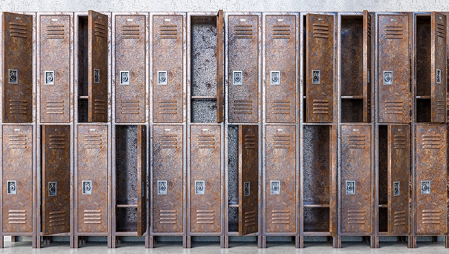 A row of old rusty school lockers.