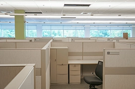 Empty cubicles in an office building.