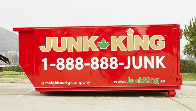Red Junk King dumpster.