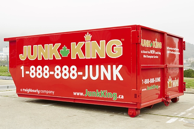 Red Junk King dumpster.