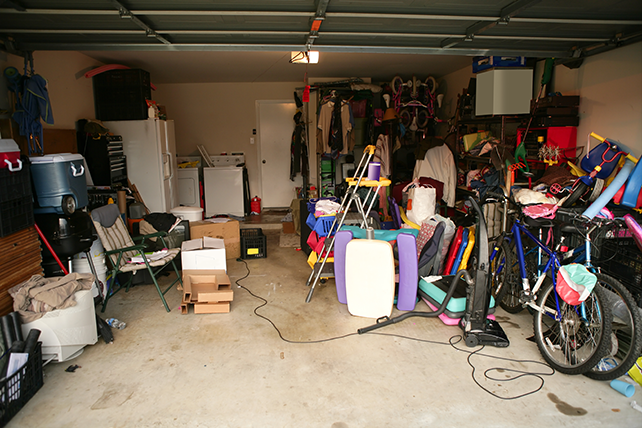 A garage that is in need of a clean out.