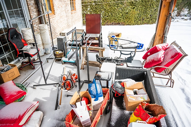 A porch in need of clean up.